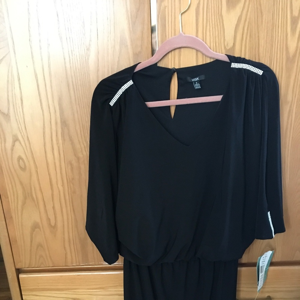 Black dress with rhinestone accent